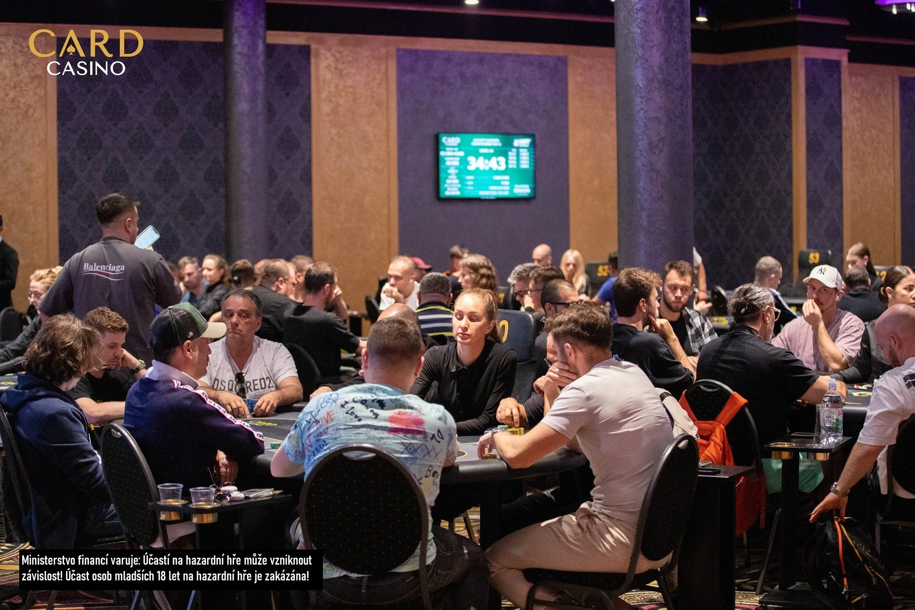 hr&aacute;či u pokerov&yacute;ch stolů grand casina &scaron;amor&iacute;n